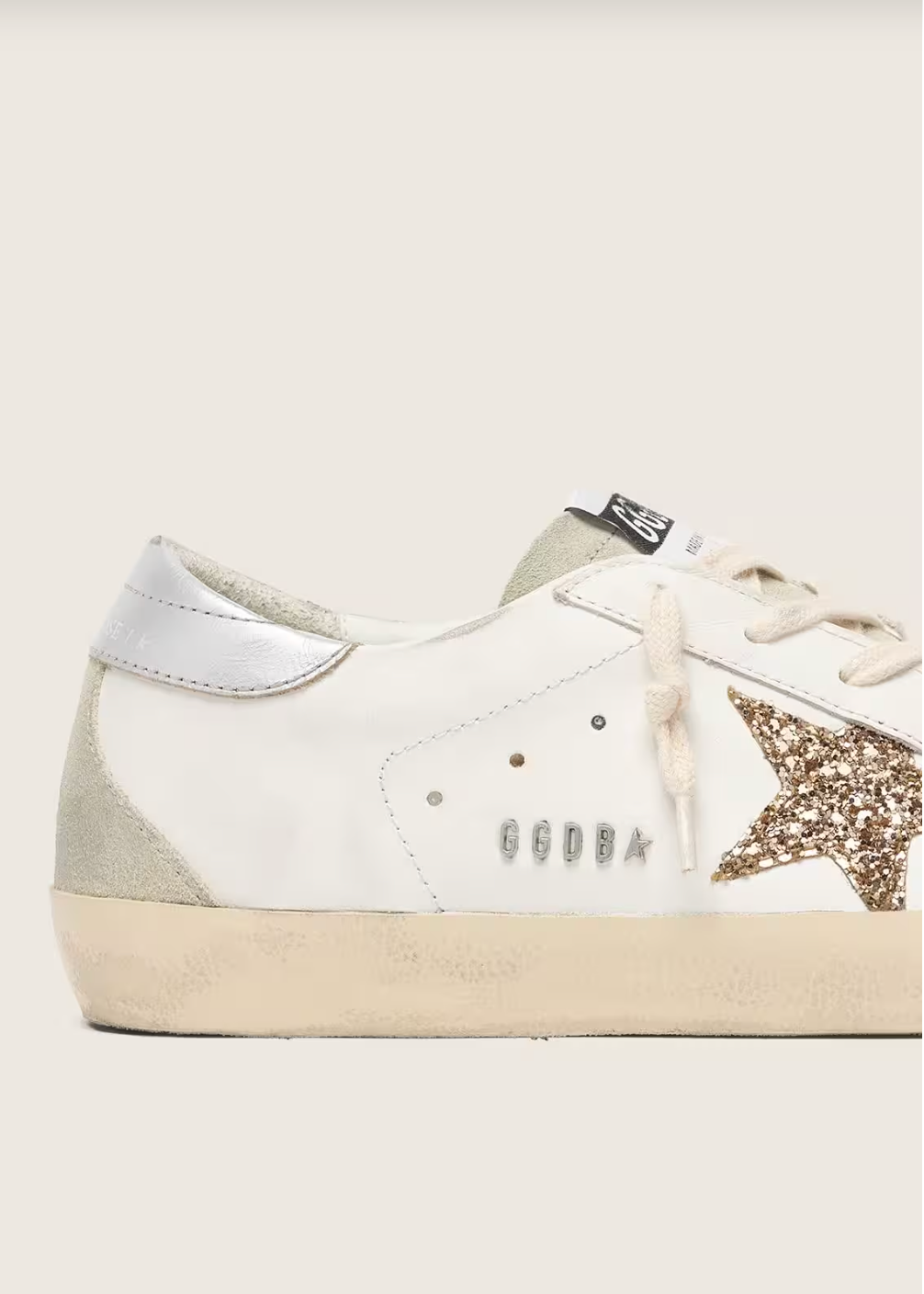 Baskets tendance Super-Star étoile dorée portées, look it-girl
